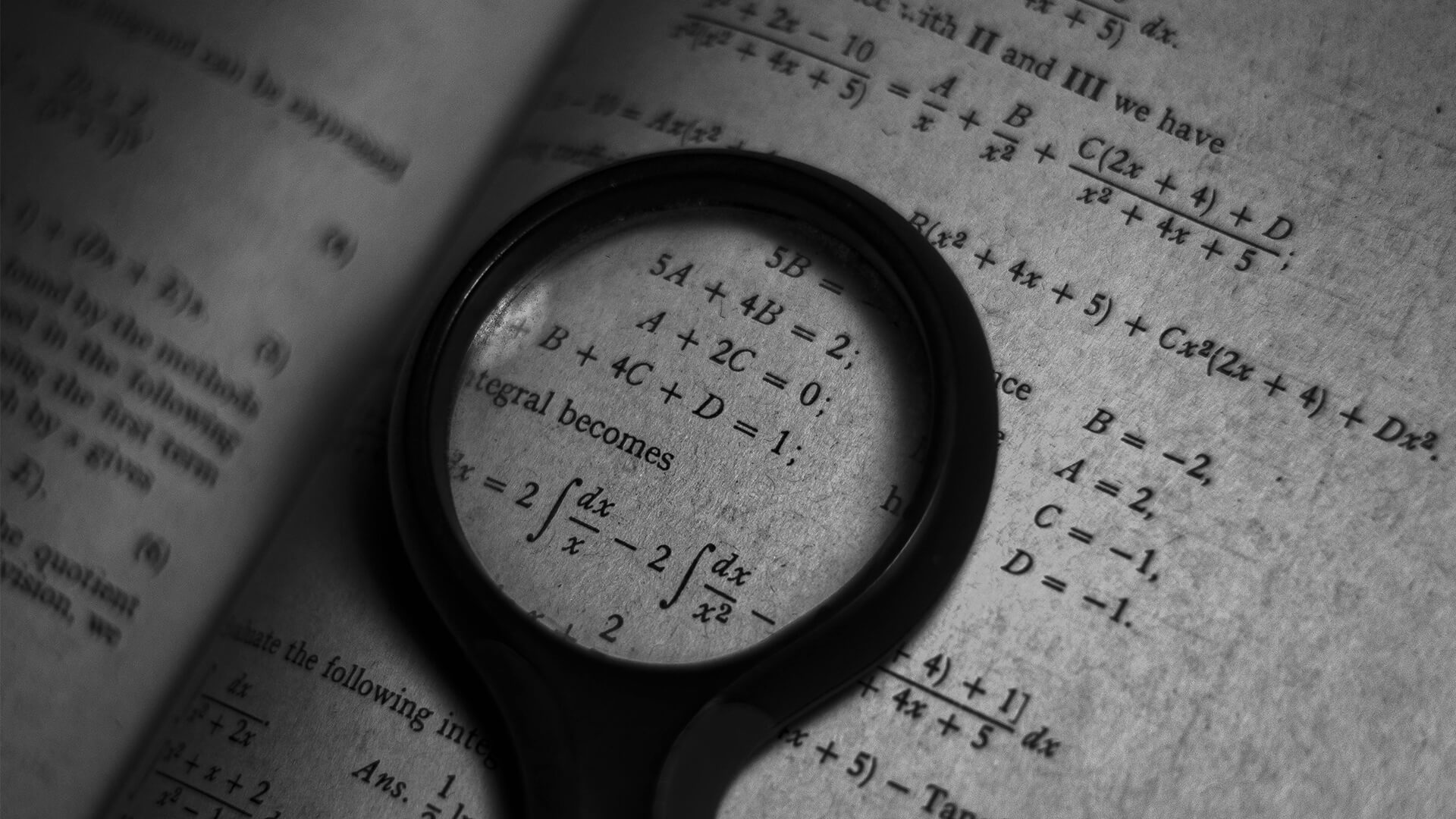 Close of up mathmatical equations in book.