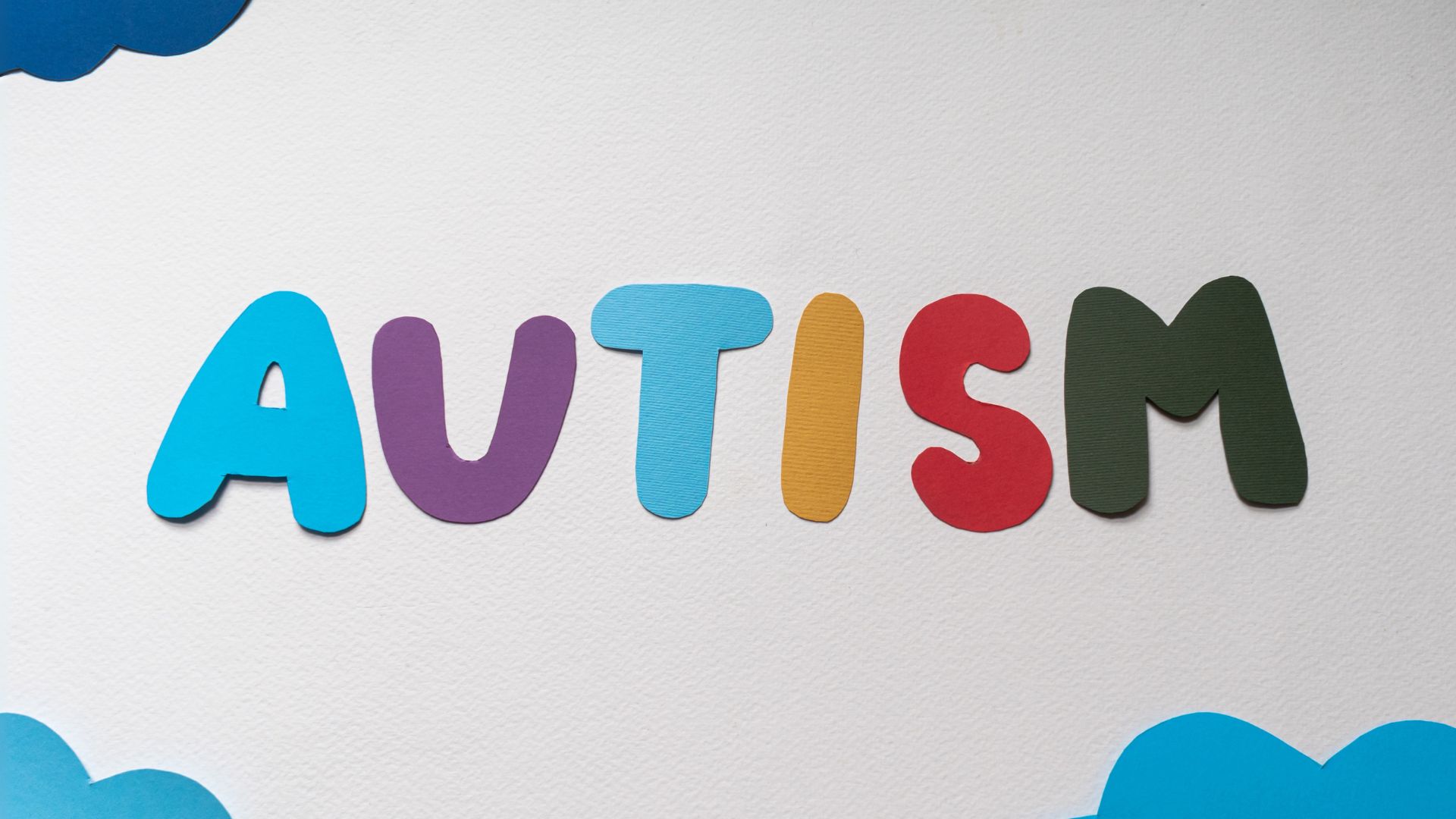 Child with adult using building blocks
