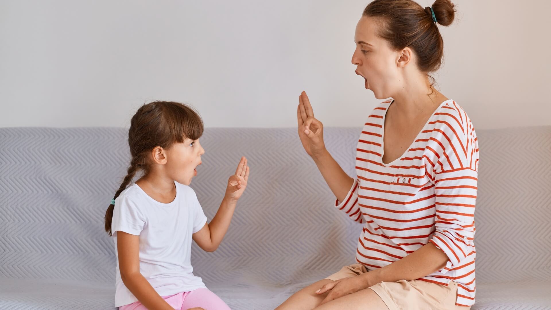 Parent helping student with speech.