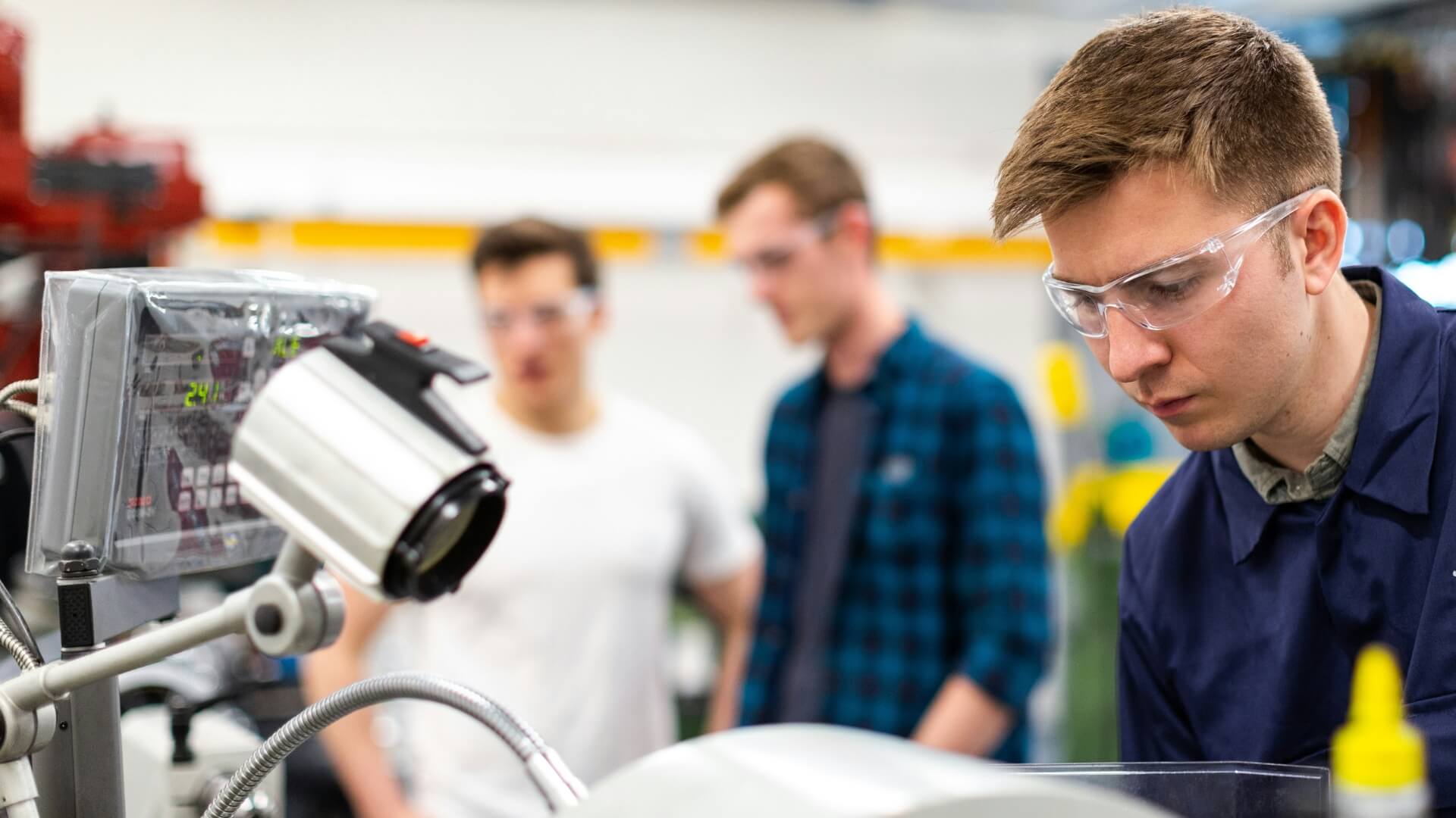 Engineer using machinery.