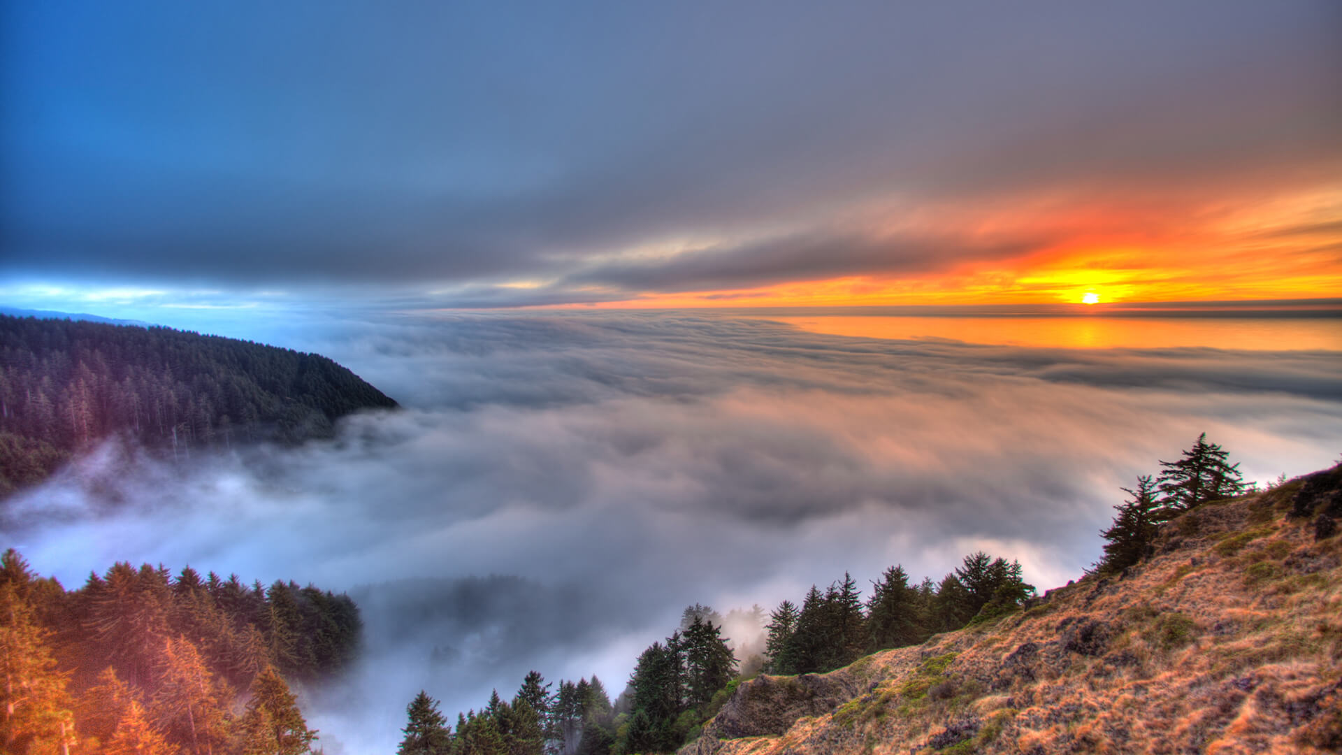 Landscape of hills, clouds and a sunset.