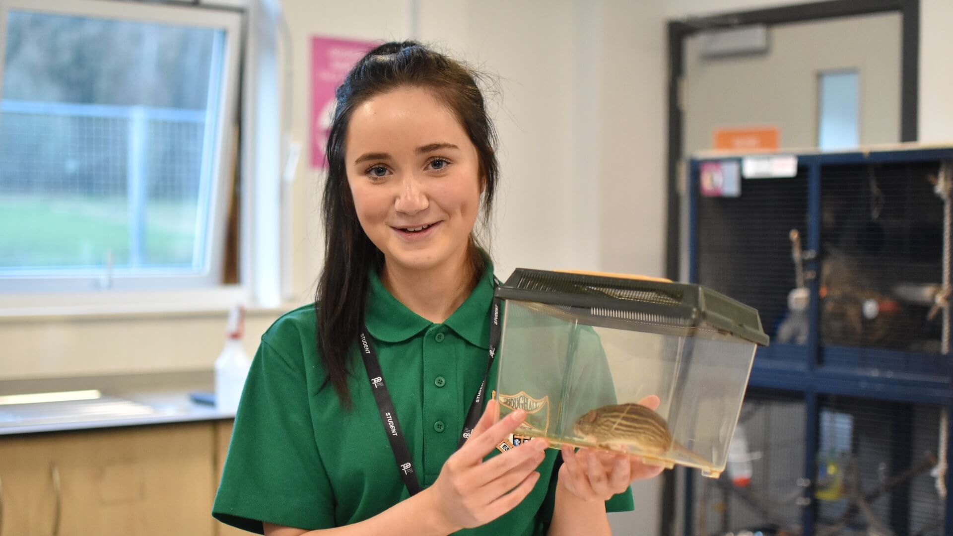 EDC student in our animal care unit.