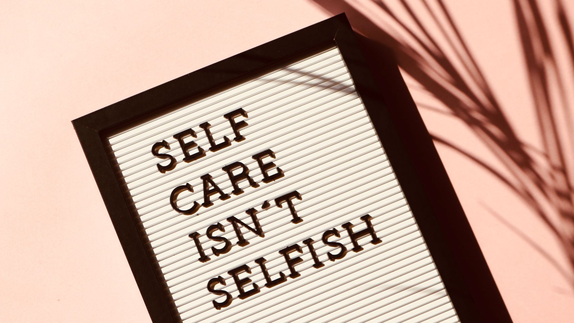 Sign with text self care isn't selfish