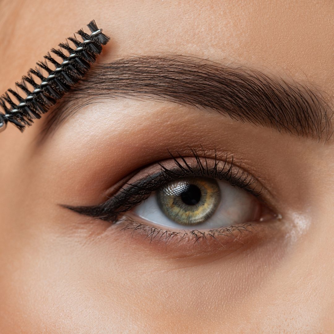 Person recieving brow treatment.