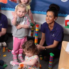 Nursery students and young girls in a nursery