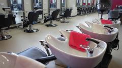 Wash basins inside the East Durham College hairdressing salon 