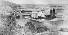 Black and white photo of Houghall Farm House and Building, Isolation Hospital and Colliery Terrace Housing in the Background from early 20th Century