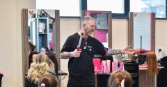Lee Stafford teaches students in hair salon