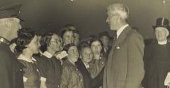 Black and white photo Mr WS Morrison meeting a group of students in 1938 when he official opened Houghall