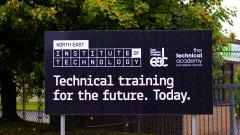 A large exterior sign at the East Durham College North East Institute of Technology