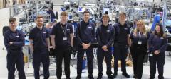 A group of 8 Alexander Battery Technologies Apprentices