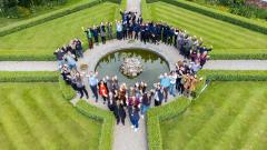 East Durham College Staff and Students Gathered Around Fountain