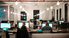 Office space with workers at PCs