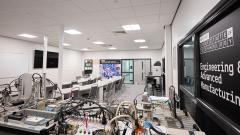 Wide shot of NEIOT suite, showing engineering equipment and desks